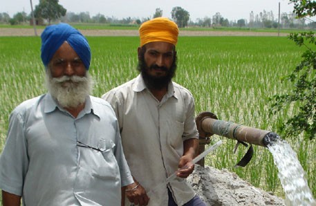 Punjab farmers near water tube