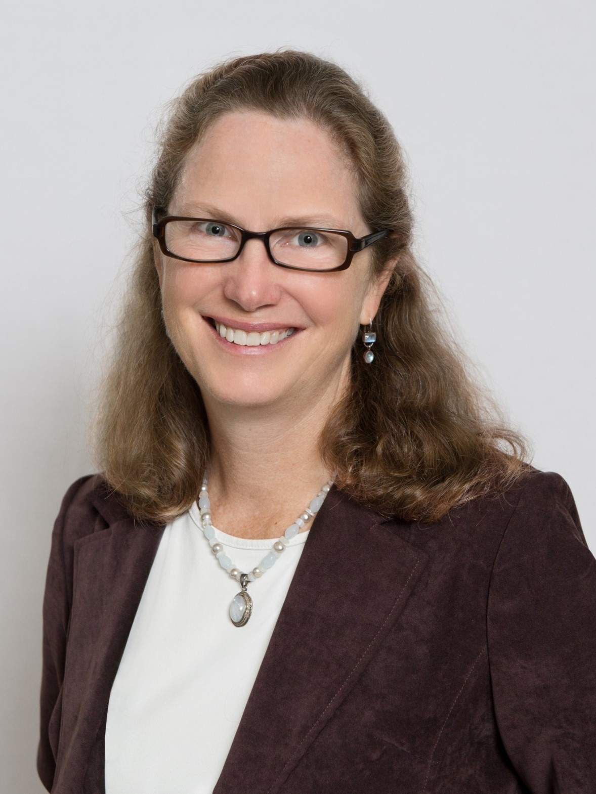 Margaret Bowman headshot on neutral background