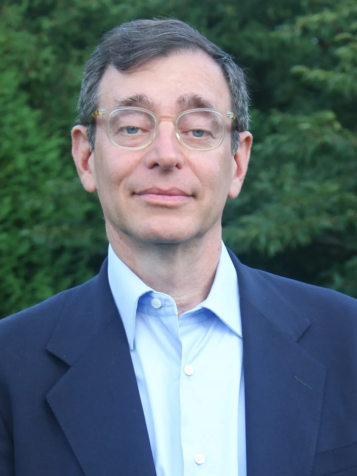 Seth Siegel headshot on green background