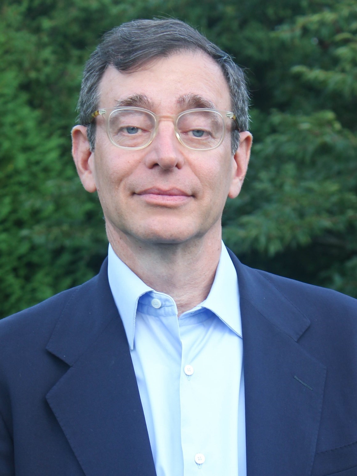 Seth Siegel headshot on green background
