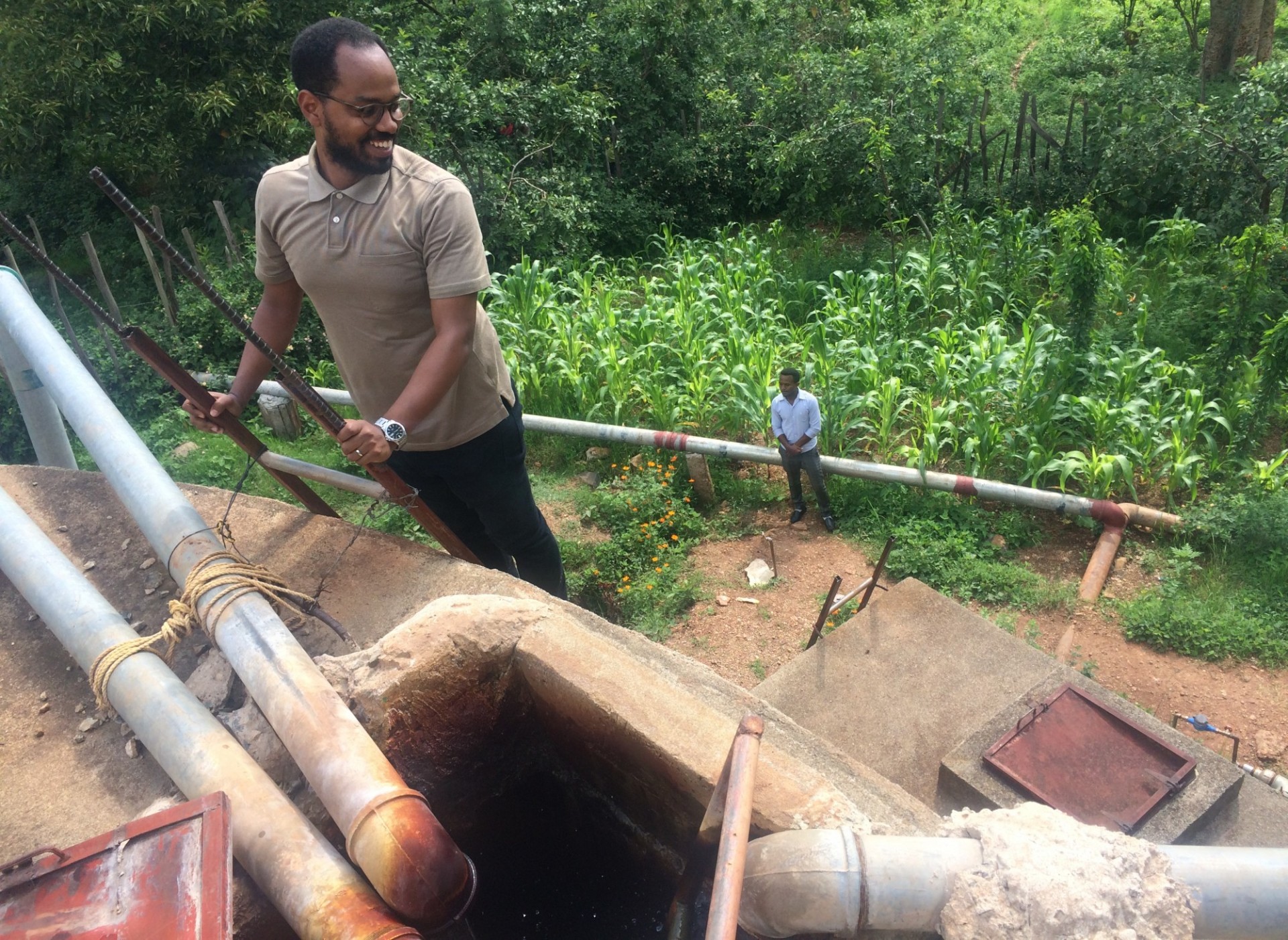 Man atop water storage container